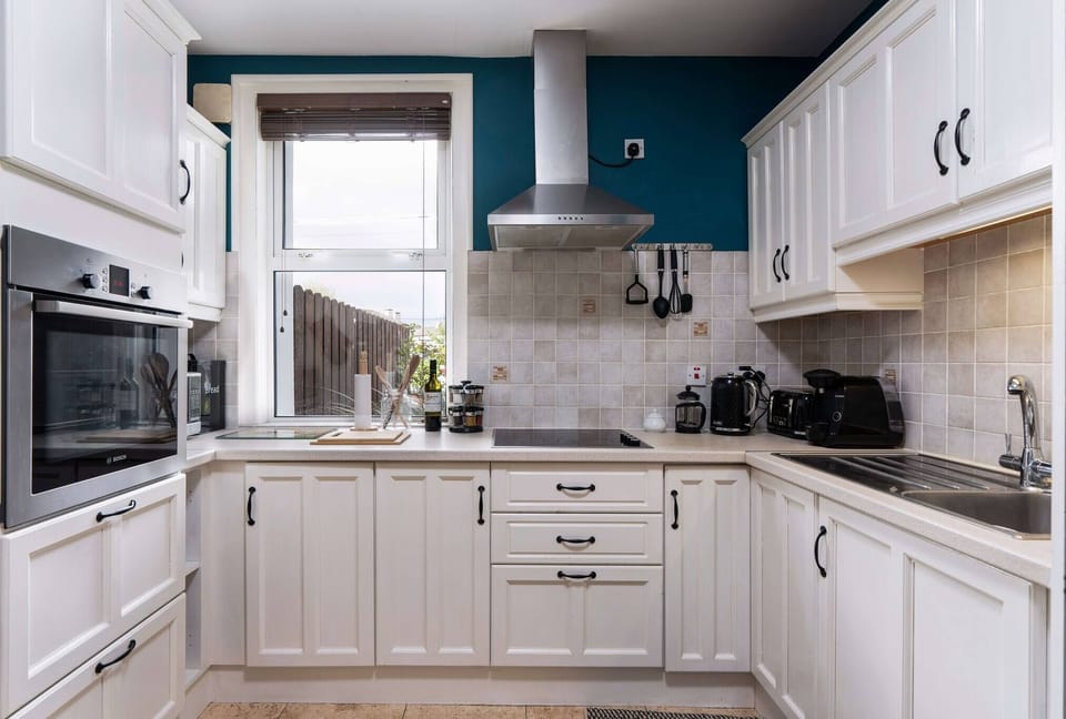 Our modern kitchen is stocked with everything you need for prepping & serving.