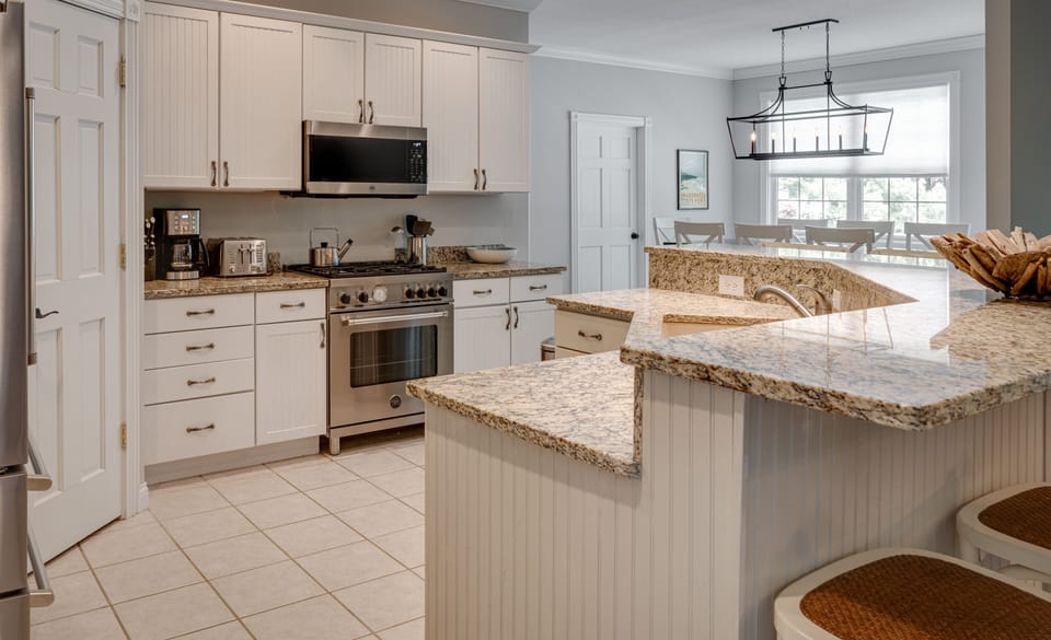 Kitchen with high end appliances, large pantry, island with seating for 6