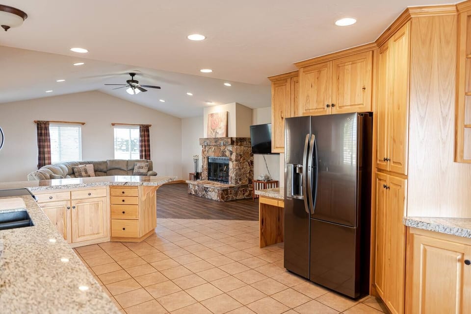 Spacious kitchen with modern appliances allows for cooking for a large group