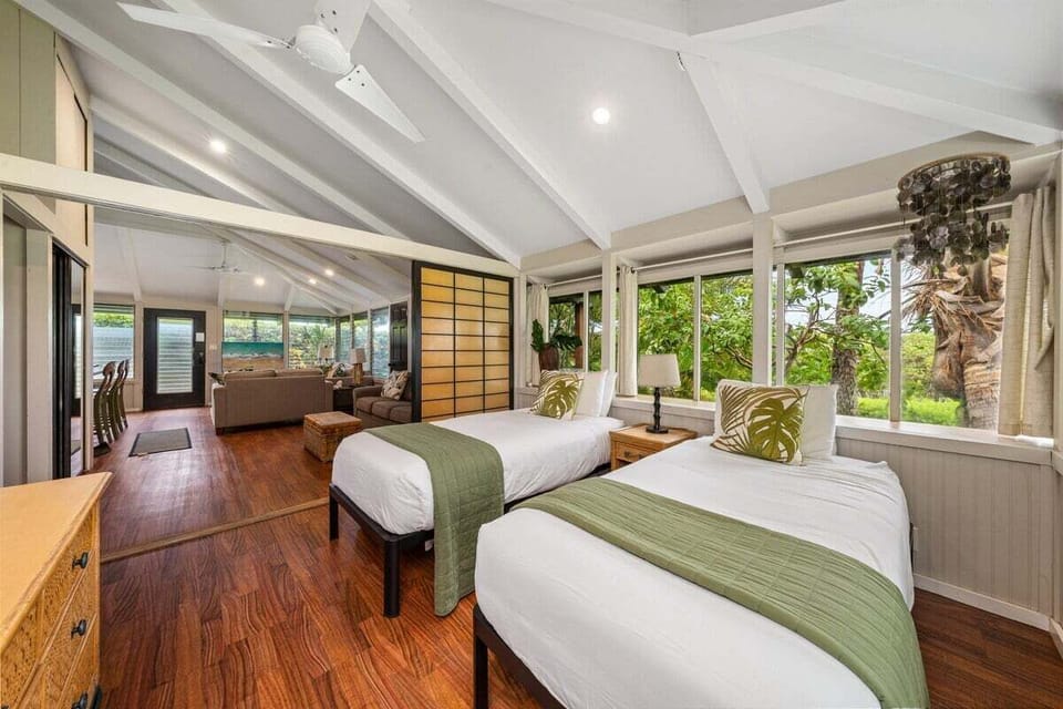 Functional bedroom with two twin beds and simple décor