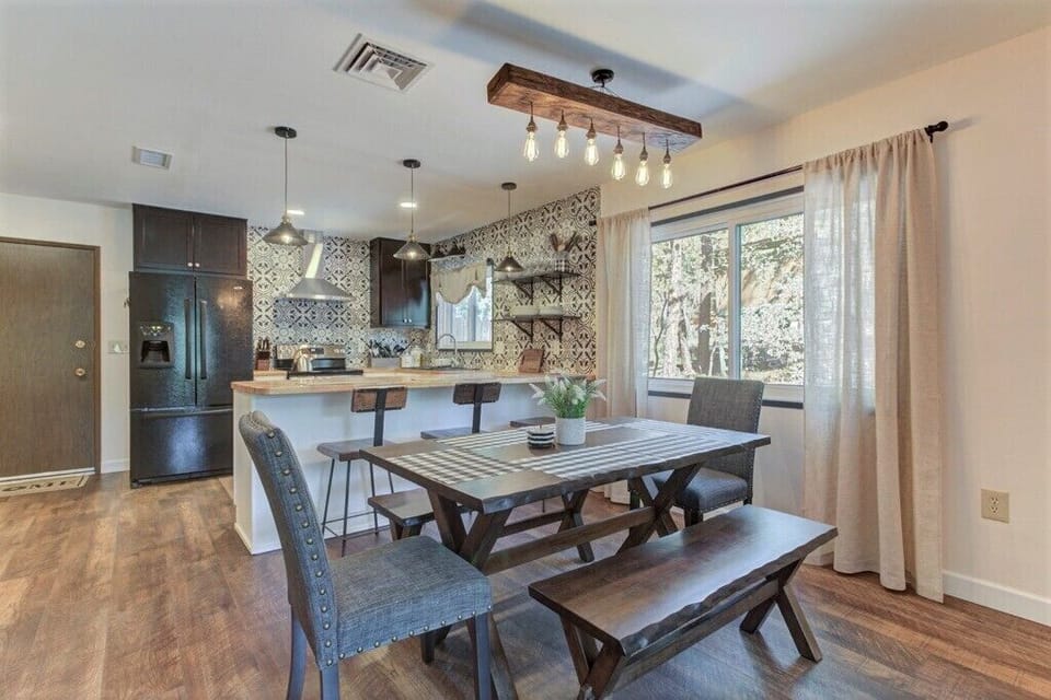 Dining table can sit 6 people comfortably and maybe 8 if they like each other!