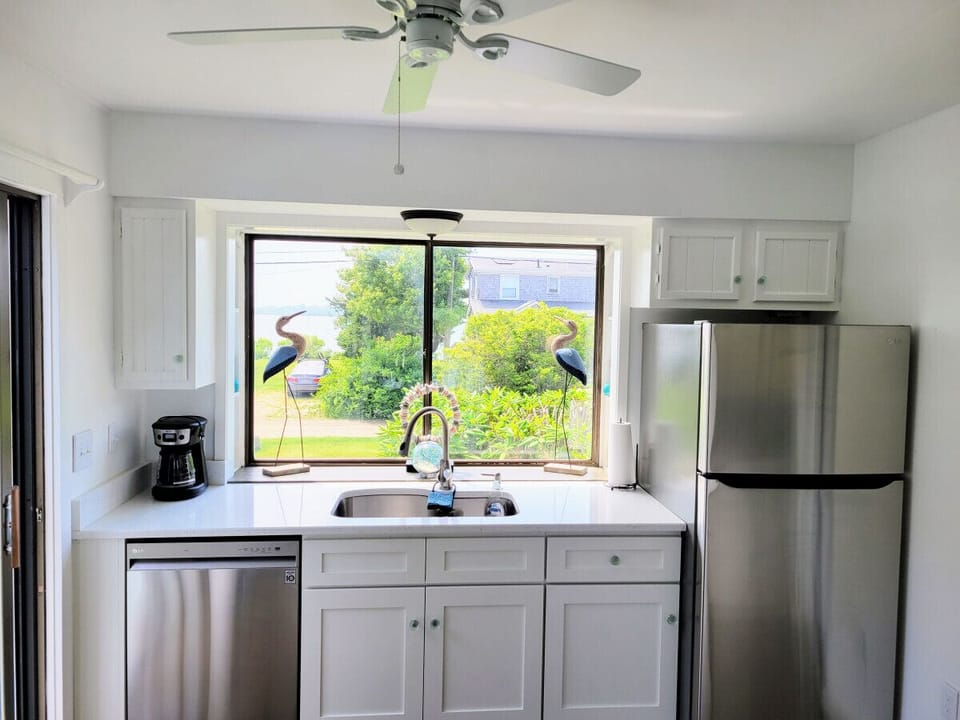 Newly renovated kitchen with water view.