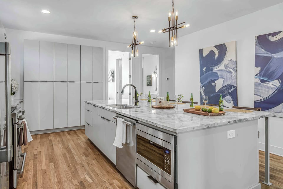 Enjoy a modern kitchen on Level 2 with stainless steel appliances and a large prep island