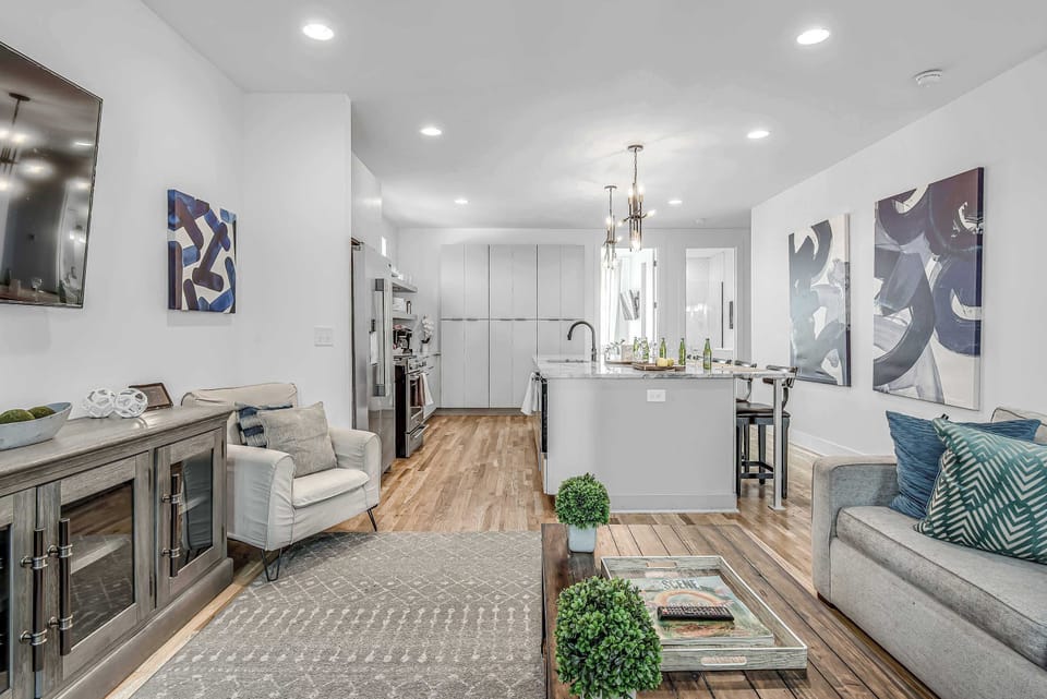 Level 2 features an open-concept living and kitchen area, creating a spacious and inviting space for gathering, dining, and relaxing together.