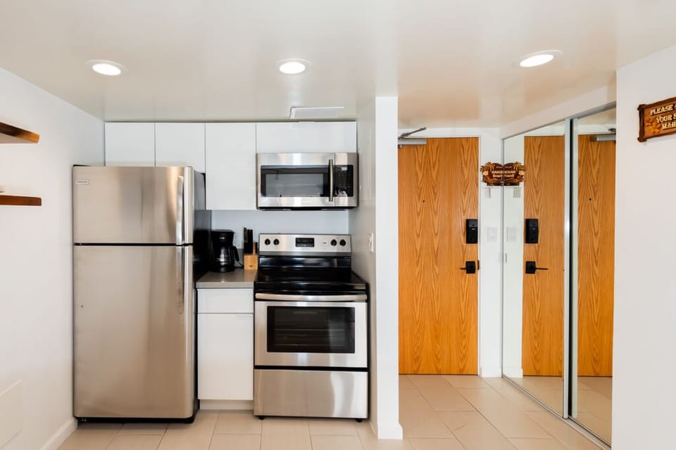 Fully stocked kitchen to reheat take-outs and cook simple meals. 