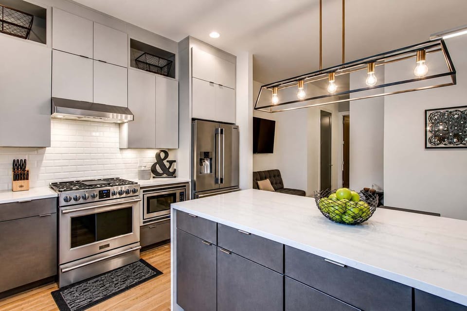 Well-appointed kitchen with stainless steel appliances and everything needed for cooking, dining, and entertaining.