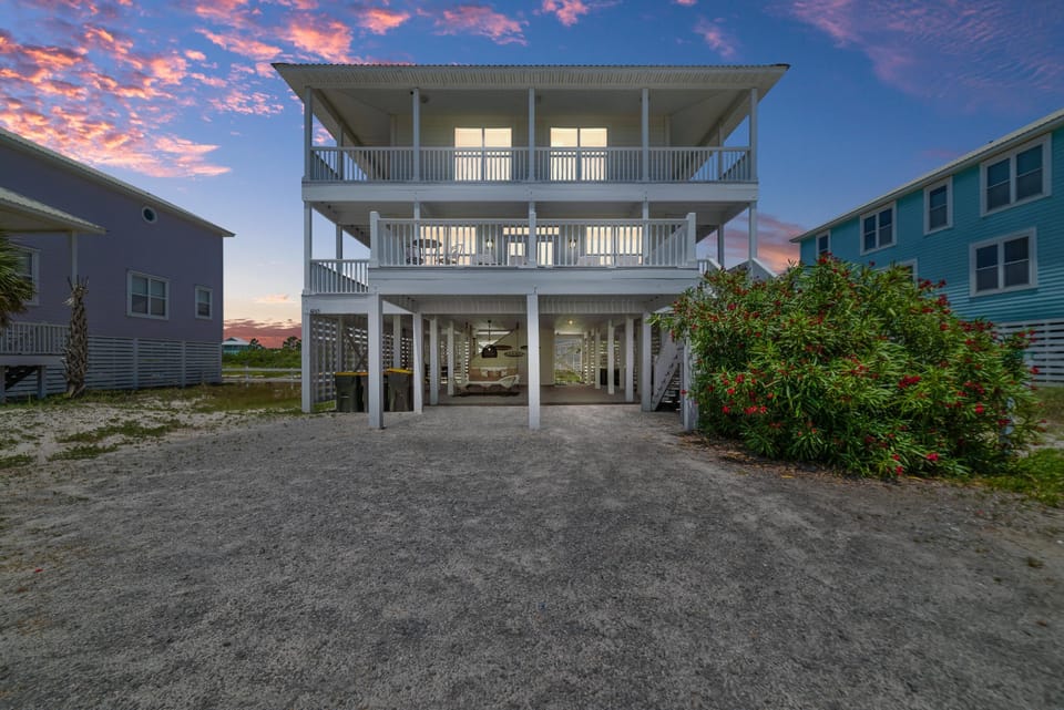 Newly updated cottage with a view of the Gulf from multiple levels of wrap around decks. Access the decks from most rooms in the property for a great view