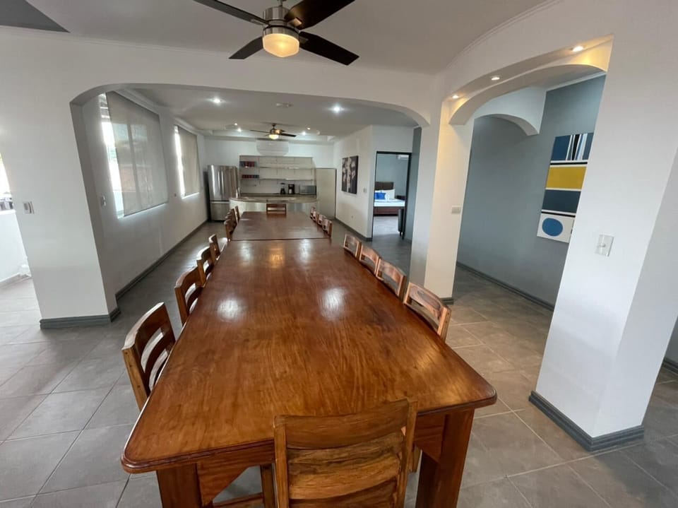 Huge custom dining table to enjoy group dinners. Book JacoVIP chef service! Yum