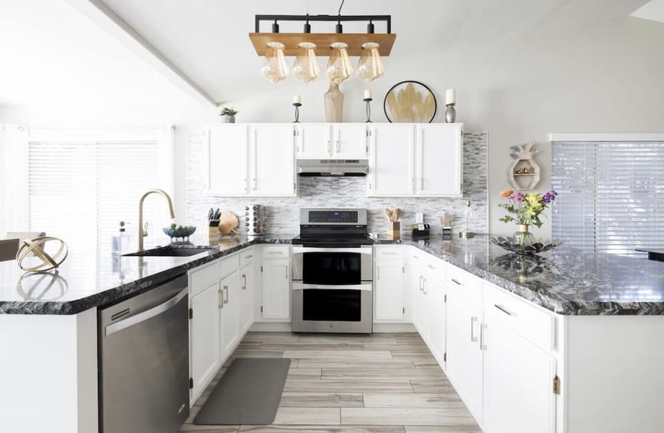 Well stocked kitchen with new appliances, double oven and ice maker