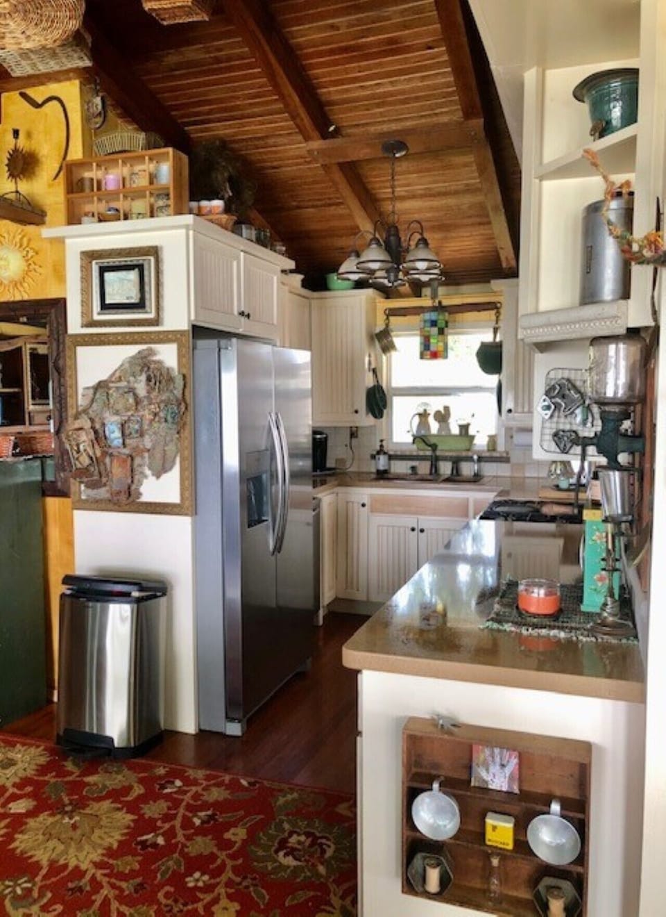 Open kitchen area with deep double copper sink.