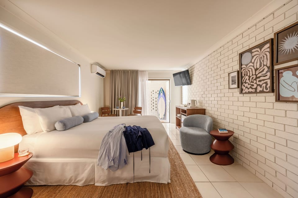 Standard Queen Room | Blackout drapes, iron/ironing board, cribs (surcharge), WiFi (free)