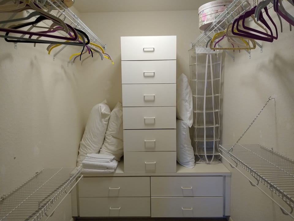 Master walk-in closet.  This is one of two closets in the master bedroom.