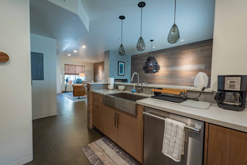 Open floor plan from kitchen into the living room and dining room
