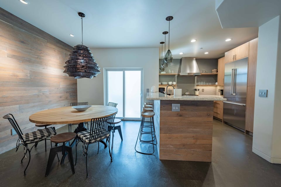 Sliding glass door off of the dining room providing natural light into the home