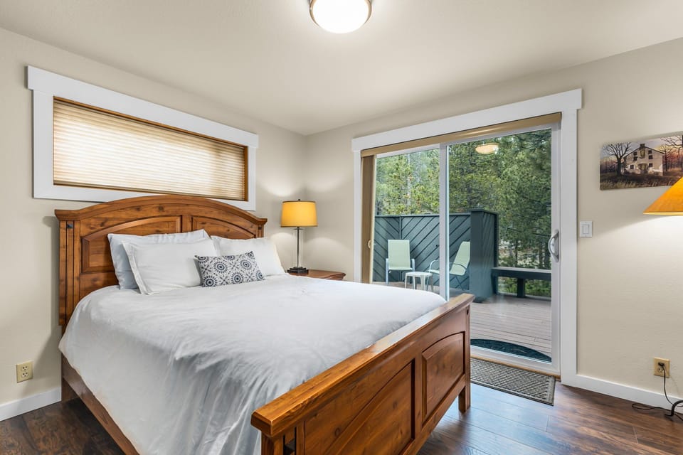 Queen bed on first floor w/access to patio