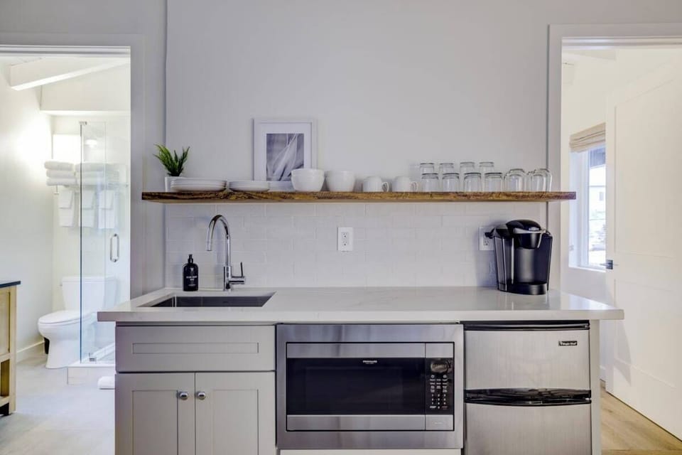 Compact kitchenette: Keurig, microwave, mini fridge. No stove.