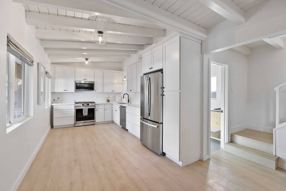 Full kitchen: Keurig, fridge, stove/oven, plates and utensils ,dishwasher