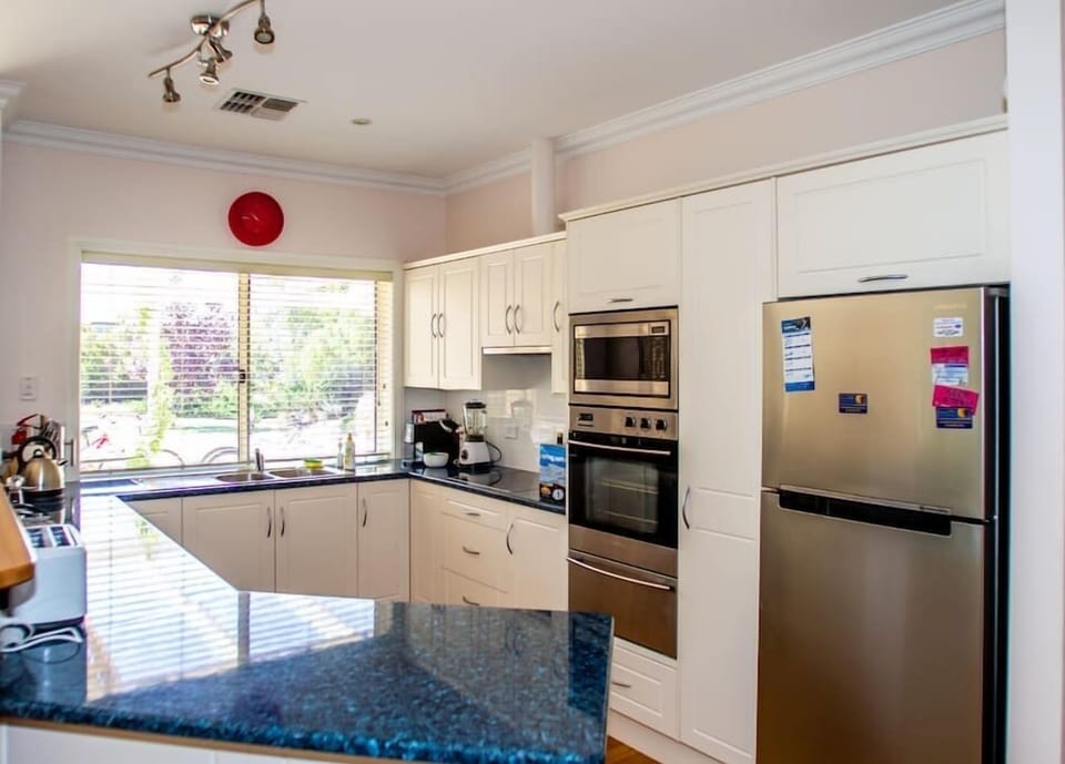 `A culinary haven with modern appliances and essentials.