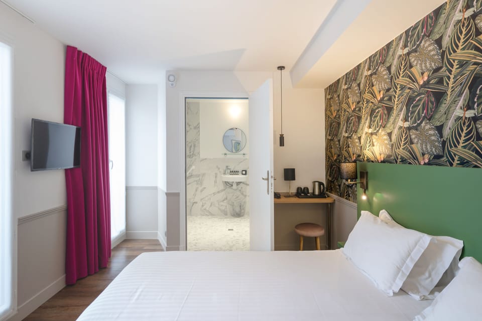 Deluxe Double Room, Balcony, Courtyard View | In-room safe, desk, laptop workspace, blackout drapes