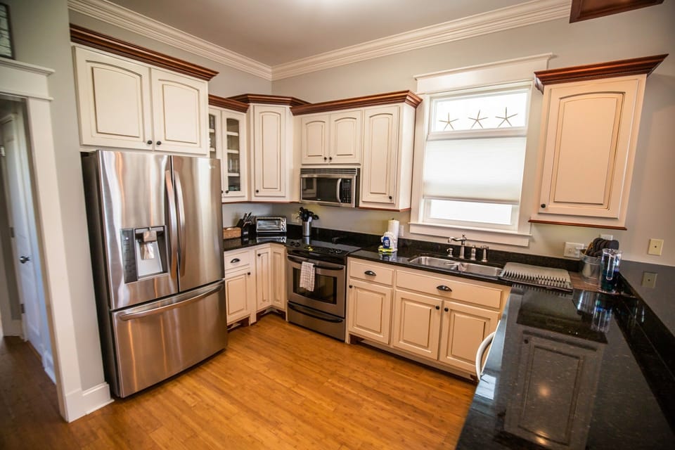 Your fully equipped kitchen with stainless steel appliances and granite countertops makes meal prep a joy.