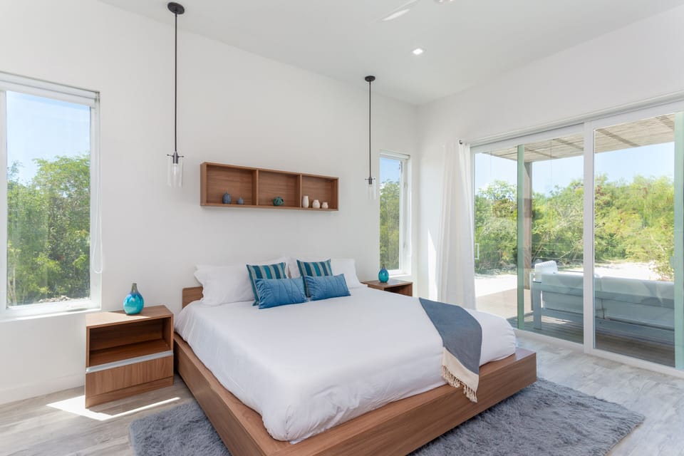 Bedroom 1- Tastefully decorated, with  smart TV and private deck