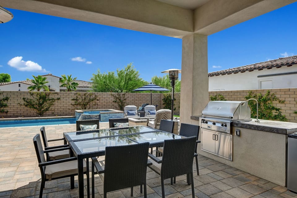 FRONT COVERED DINING AND BUILT IN BBQ