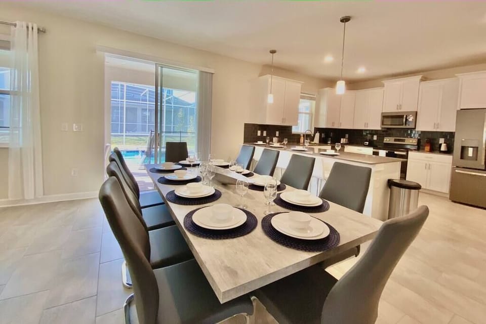 Moder expandable dining table with 10 chairs