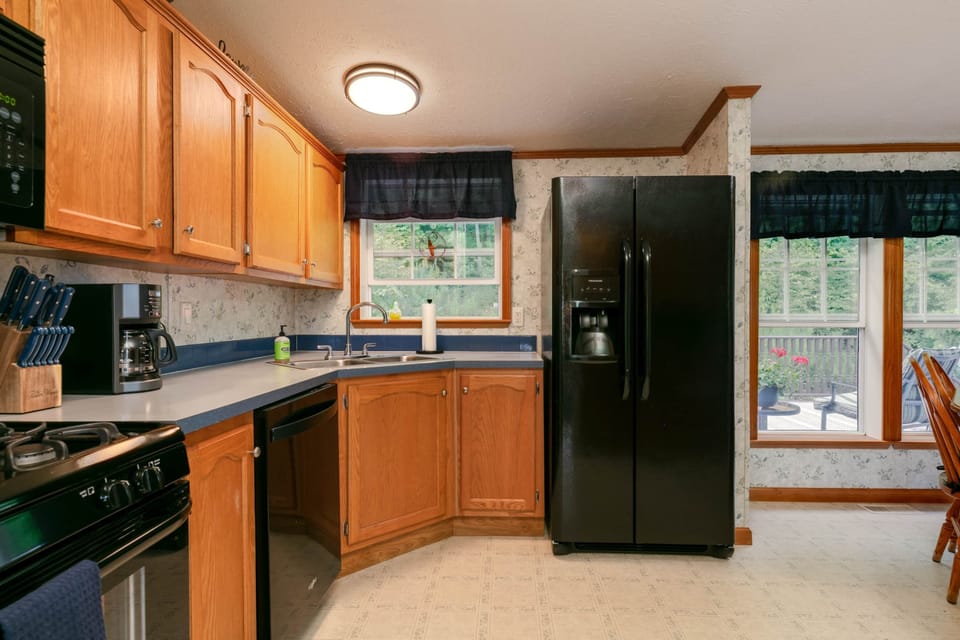 New appliances- kitchen stocked with dinnerware, cookware, glasses & cutlery