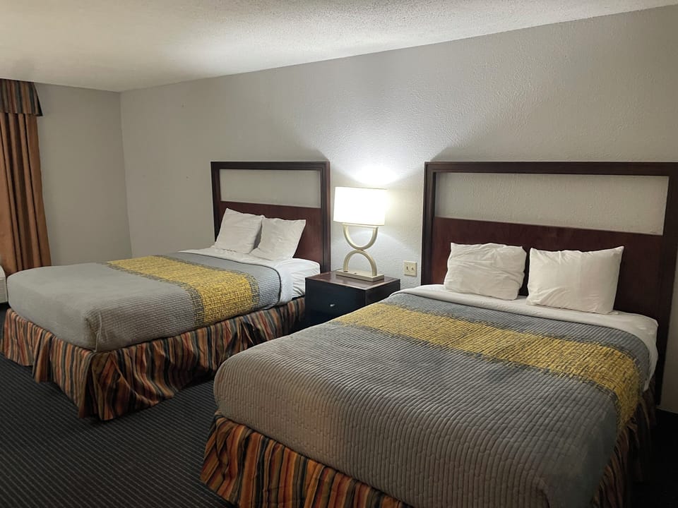 Standard Room, 2 Queen Beds, Non Smoking | Free WiFi, bed sheets