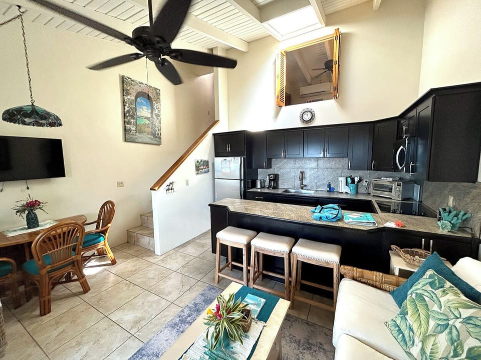 The interior dining table can seat 2-4 people.  The staircase brings you to the bedroom and bathroom level.