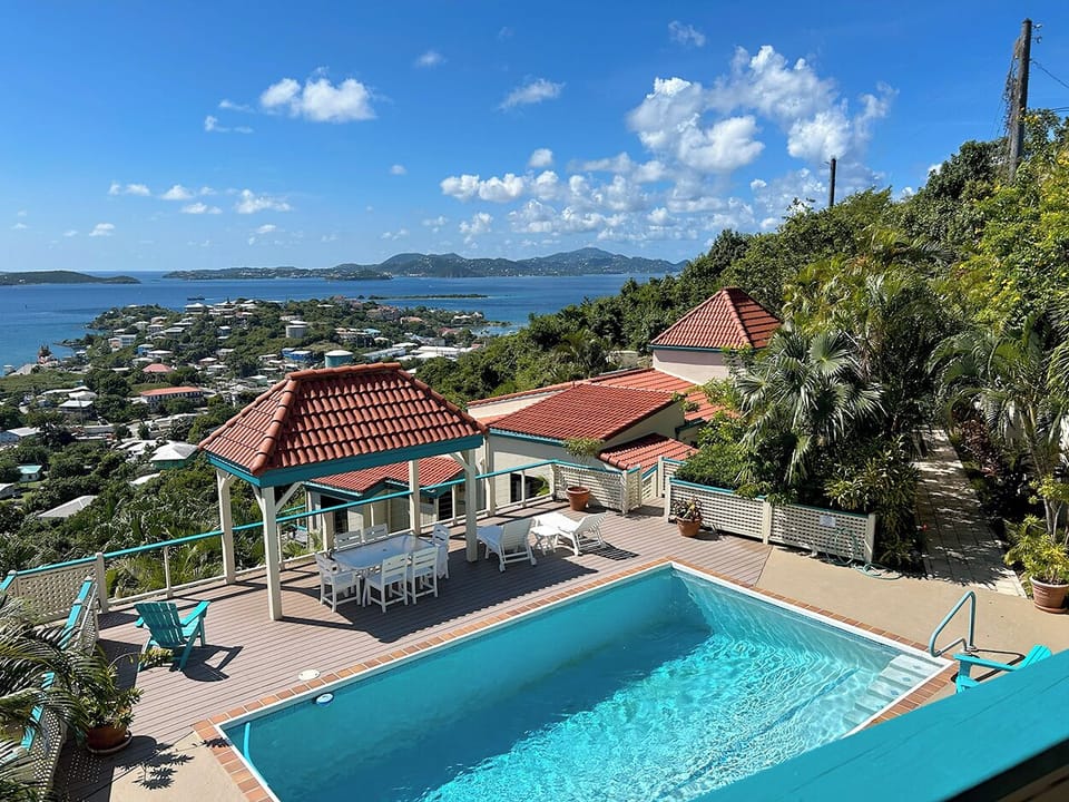 Your balcony overlooks the pool and across to St Thomas