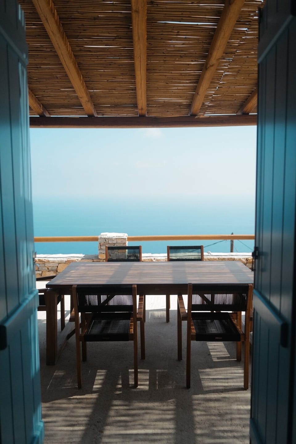 One of the two dinning tables on the  terrace