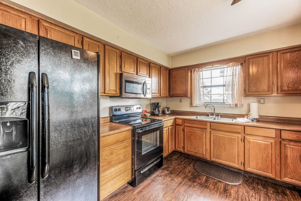 House, Multiple Beds, Fireplace, River View | Private kitchen | Coffee/tea maker, fridge, microwave, oven