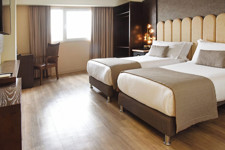 Twin Room, Non Smoking, City View | In-room safe, soundproofing, free WiFi, bed sheets