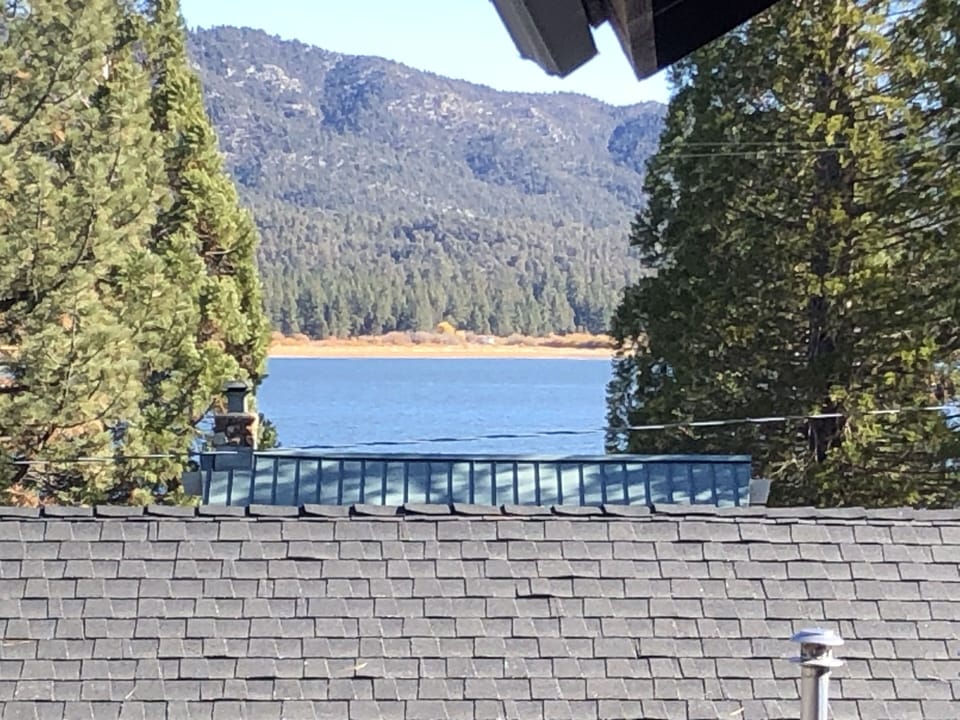 Lake view from the upstairs master bedroom suite. And from deck off living area.
