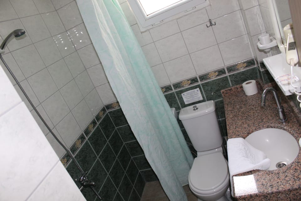 Shower, free toiletries, hair dryer, towels