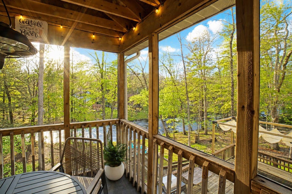 Breathtaking raised porch has you perched in the trees.
