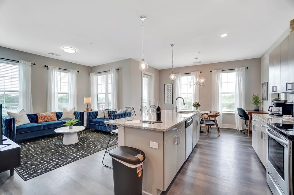 Large kitchen island with lots of counter space and seating