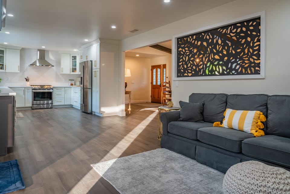Living Room with Kitchen: Open living area with a sectional and the kitchen just beyond