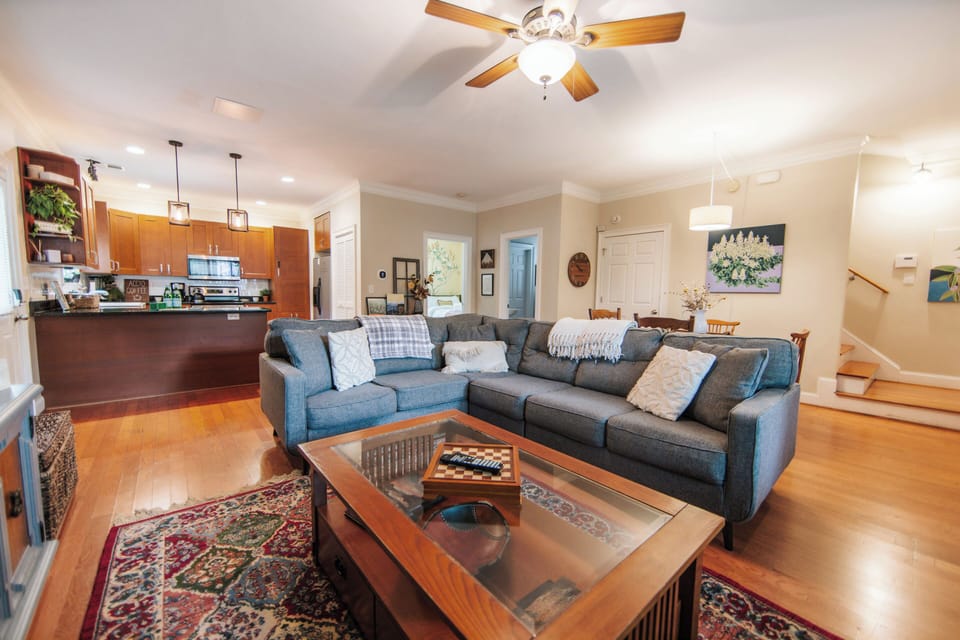 Kick back in this airy retreat featuring modern comfort and vintage charm.