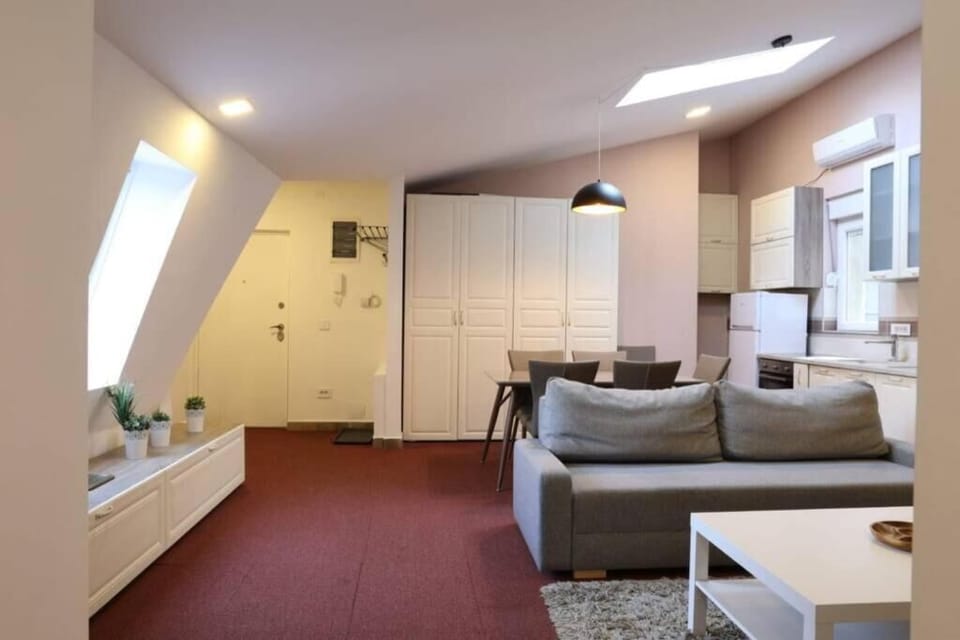 Family Apartment | Living area | 55-inch flat-screen TV with cable channels, TV