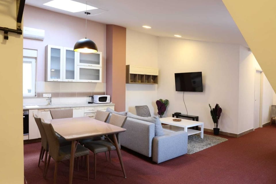 Family Apartment | Living area | 55-inch flat-screen TV with cable channels, TV