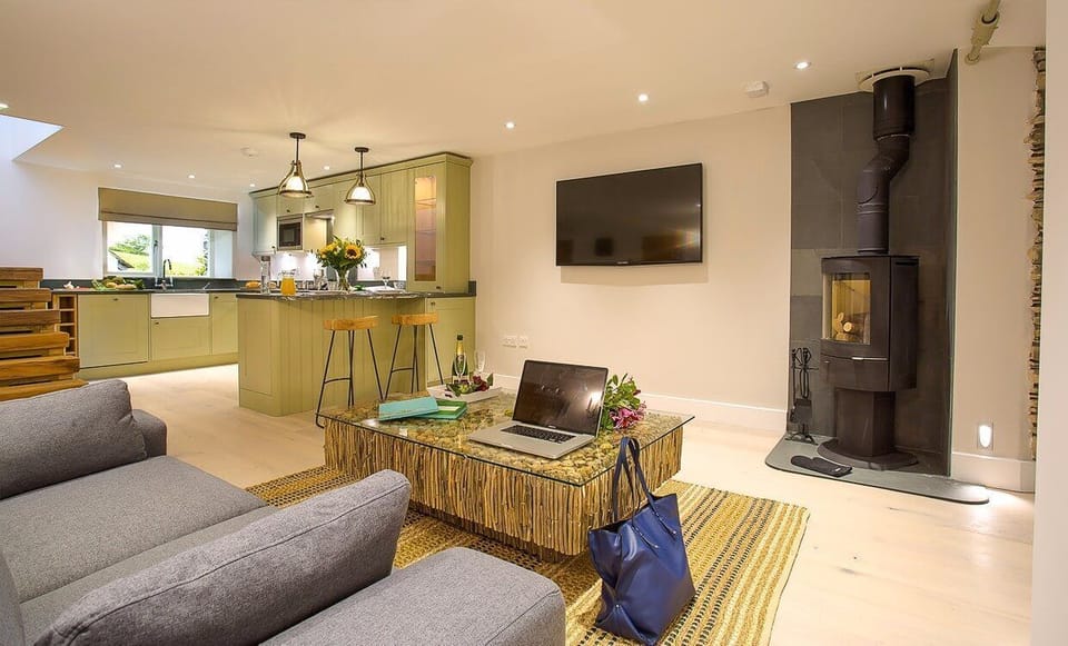 The living room with log burner at Shepherd's View, Lake District