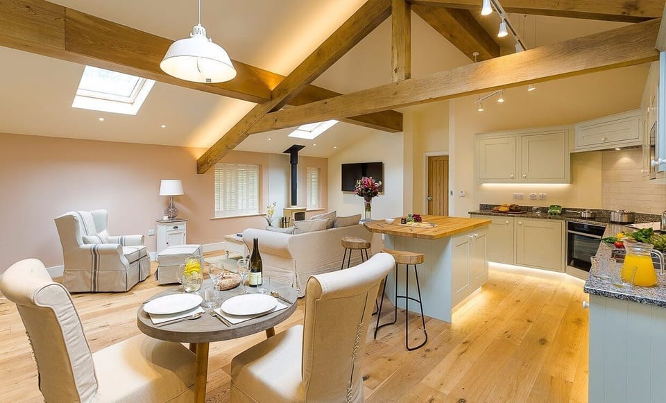 The open plan kitchen, living and dining room at Twitchers Cottage, Lake District