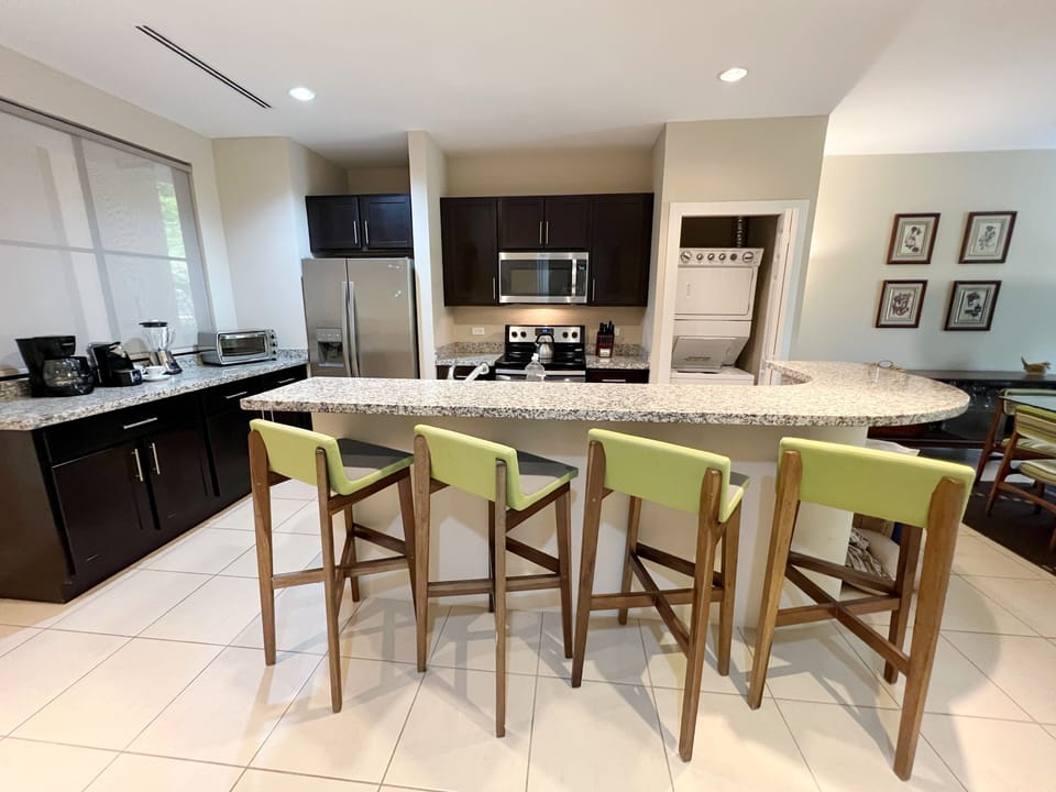 The updated kitchen has breakfast bar seating for 4.