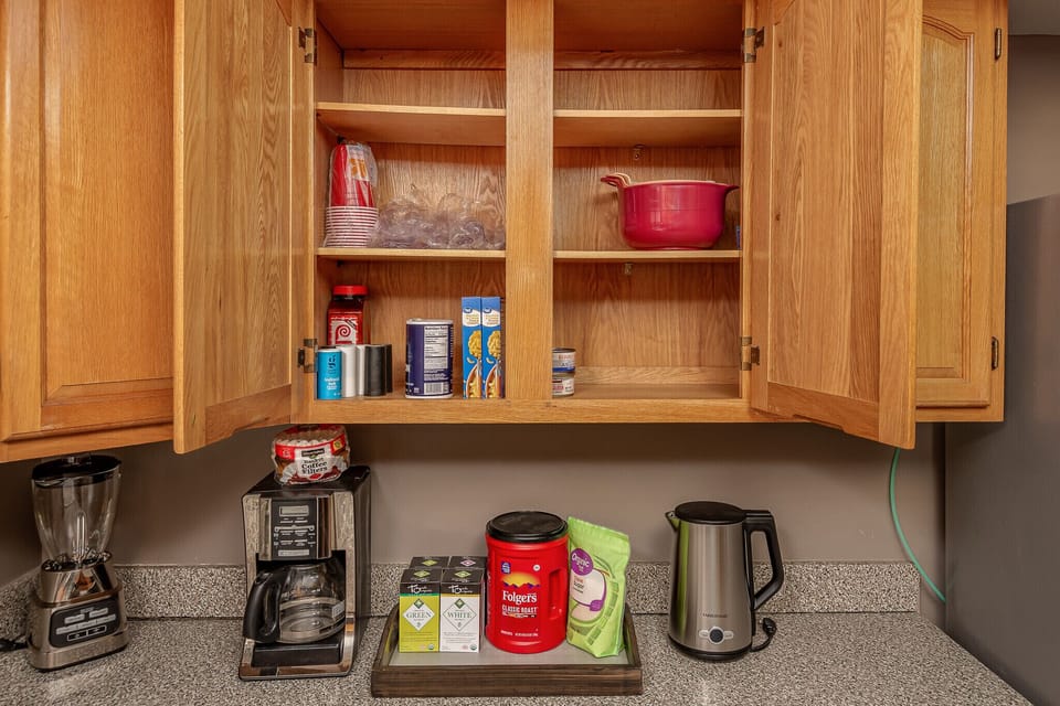 Coffee, tea, coffee maker and tea kettle. 