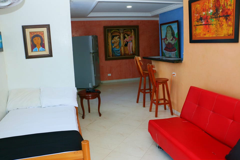 Basic Apartment | Living area | 42-inch flat-screen TV with cable channels, TV, heated floors