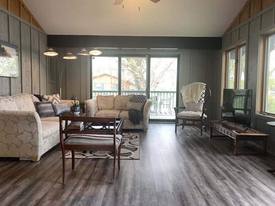 Sunroom walks out to the deck.
