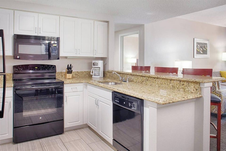 Full kitchen with all the necessities to make a meal.