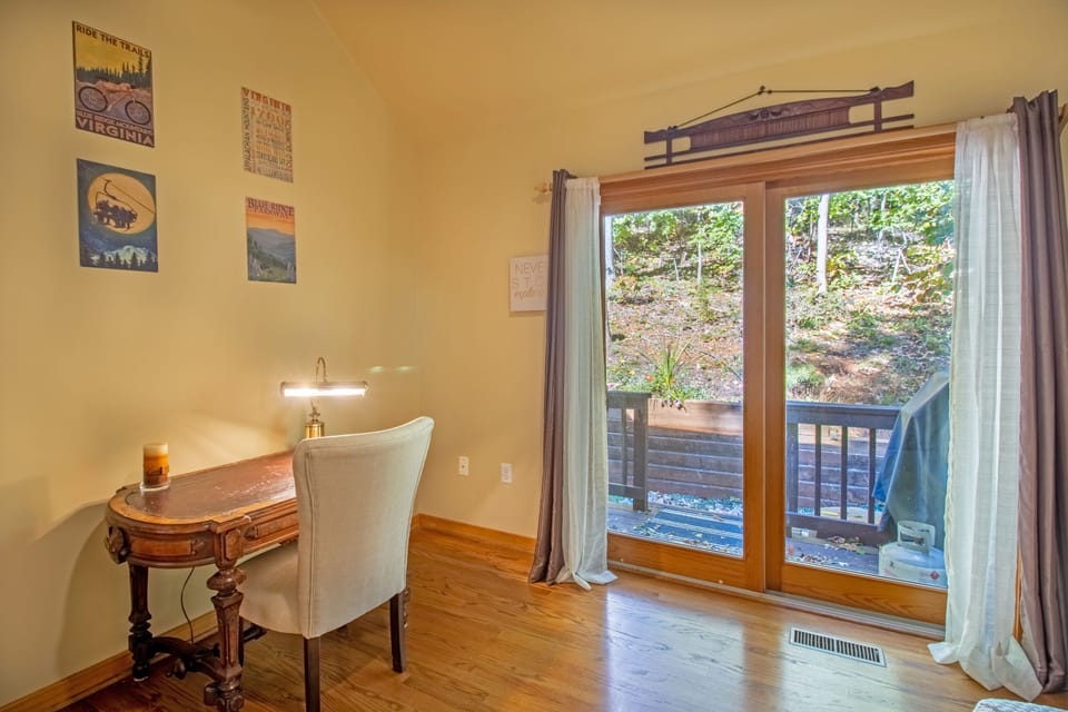 Office space with queen sleeper sofa and access to back deck with gas grill